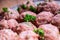 Raw meat balls. Prepared uncooked meat balls in a metal tray. Tr