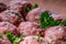 Raw meat balls. Prepared uncooked meat balls in a metal tray. Tr