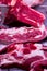 Raw meat beef tray portion chunks three fillets with bone preparation to grill steaks