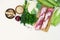Raw meat, fresh green vegetables, cereals, spices on a white background.