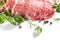 Raw meat isolated on white background. Prime fillet meat. Marble beef steak Black Angus Steak Rib eye with Herbs and Spices