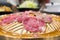 Raw meat sliced grill on hot pan, Korean barbecue or Yakiniku in