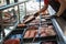 Raw meat in trays in the window of a butcher shop.