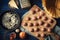 Raw meatball and spaghetti with different ingredients on the blue wooden background top view