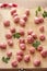 Raw meatballs on a chopping board with ingredients