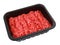 Raw minced beef in brown plastic container