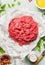 Raw minced meat with fresh green seasoning, pepper,salt and oil