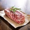 Raw new york strip steak