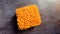 Raw orange color noodles block