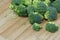 Raw Organic Broccoli on a Wooden Cutting Board