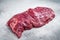 Raw Organic Flank bavette or flap beef steak. White background. Top vie