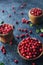 Raw organic fresh cowberry or lingonberry in wooden bowls on dark stone table