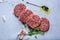 Raw organic ground beef patties for hamburgers, view above