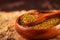 Raw Organic moong bean heap in white Bowl with selective focus on Mung dal (Vigna radiata) aka green gram, Mung Lentils