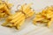 Raw Organic Yellow String Beans in a bunch on white background. Organic yellow wax bean on a table