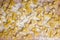 Raw pasta. Farfalle closeup on wooden table