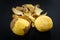 Raw peeled potatoes and potato peelings