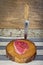 raw Picanha steak on wooden background in rustic style. Knife on table