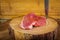 raw Picanha steak on wooden background in rustic style. Knife on table