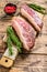 Raw picanha or Top Sirloin Cap steak on a chopping Board. wooden background. Top view