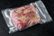 Raw piece of marble beef brisket,with ingredients for smoking  making  barbecue, pastrami, cure, vacuum sealed ready for sous vide