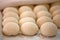 Raw pieces of bread dough before fermentation and baking