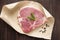 raw pork chop steak on paper and wooden background