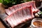 Raw Pork Rib Meat on Wooden Cutting Board