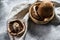 Raw Portobello mushrooms. Farm organic food. Gray background. Top view