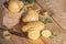 Raw potato, Fresh potatoes in bag on wooden table. prepare for cooking