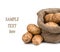 Raw potatoes in burlap bag with sample text