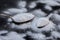 Raw powdered baking soda in a antique spoon on wooden surface