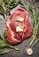 Raw ribeye steak with fresh herbs variety and butter, ingrediets for cooking