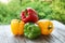 Raw ripe paprika peppers on table