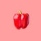 Raw ripe red bell pepper floating isolated on cherry pink background. Creative food poster