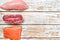 Raw salmon, beef and Turkey. Fresh organic meat. White wooden background. Top view. Copy space