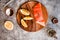 Raw salmon filet on gold board and gray slate background, wild atlantic fish.Omega3