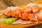 Raw salmon skewer