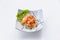 Raw Salmon Spicy Salad in Japanese Painted Ceramic Dish