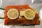 Raw salmon w lemon, butter, garlic and dill