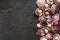 Raw scallops on slate stone background. Seafood, Shellfish, top view, flat lay, macro