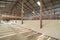 Raw sea salt heap inside traditional local wooden storage barn. Nature material in salt industry factory