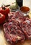 Raw shinbone meat on a wood background