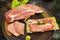 Raw sliced meat on a plate, prepared to be grilled. Yakiniku is Japanese-styled grilled meat.
