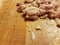 Raw slimy chicken meat on wood cutting board