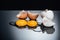 Raw smashed chicken eggs with yolks, proteins and eggshell isolated on black.