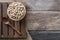 Raw soybeans in wood bowl with wood spoon on gunny sack cloth on wooden table