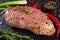 Raw spicy pork meat roulade, top view