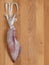 Raw squid, cuttlefish, isolated on wooden cutting board background