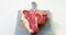 Raw steak garnished with herb on chopping board